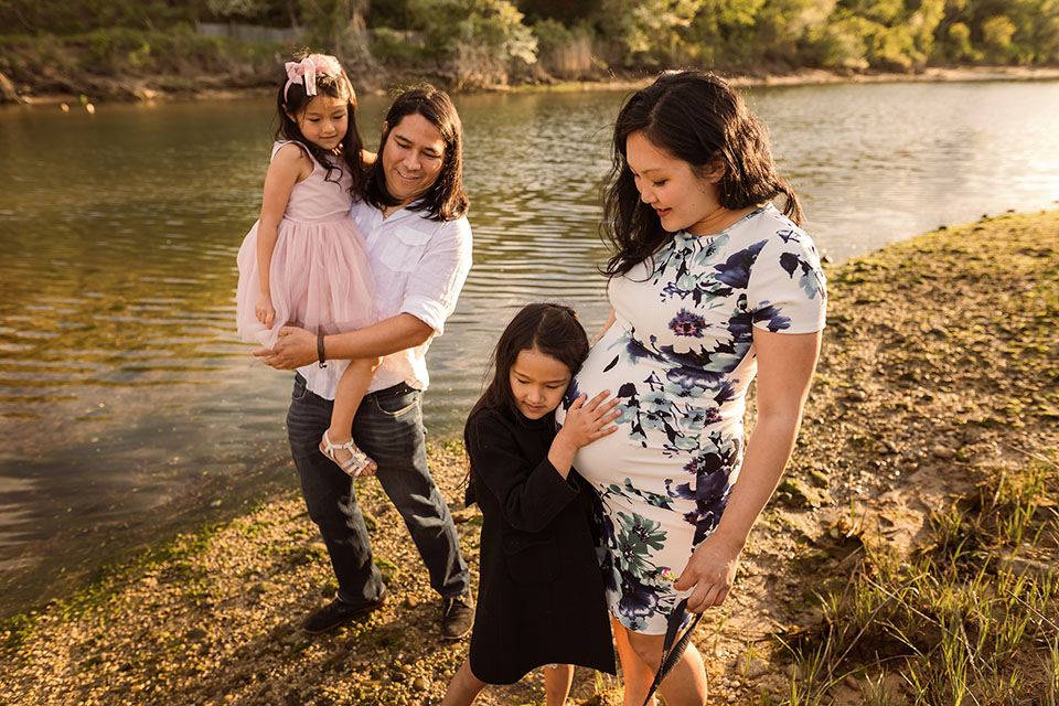 Pregnant woman taking photos